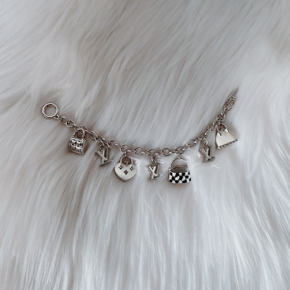 White Purse and Fancy Charm Bracelet